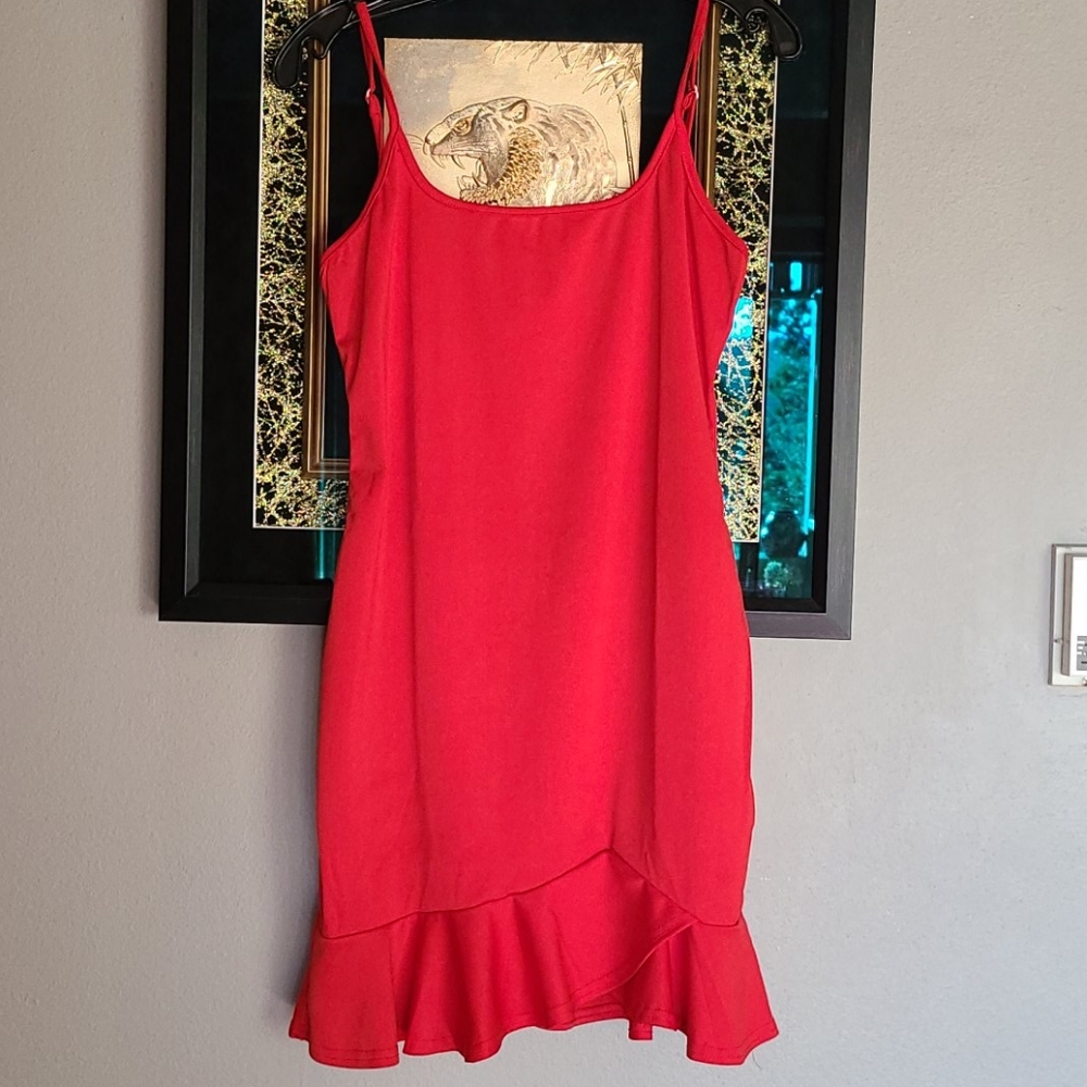 New red flutter bottom strapping sexy dress. It's just perfect for summer partys